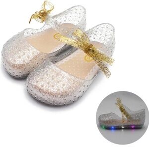 Glittery Silver jelly Kids Shoes with Gold Bow has lights